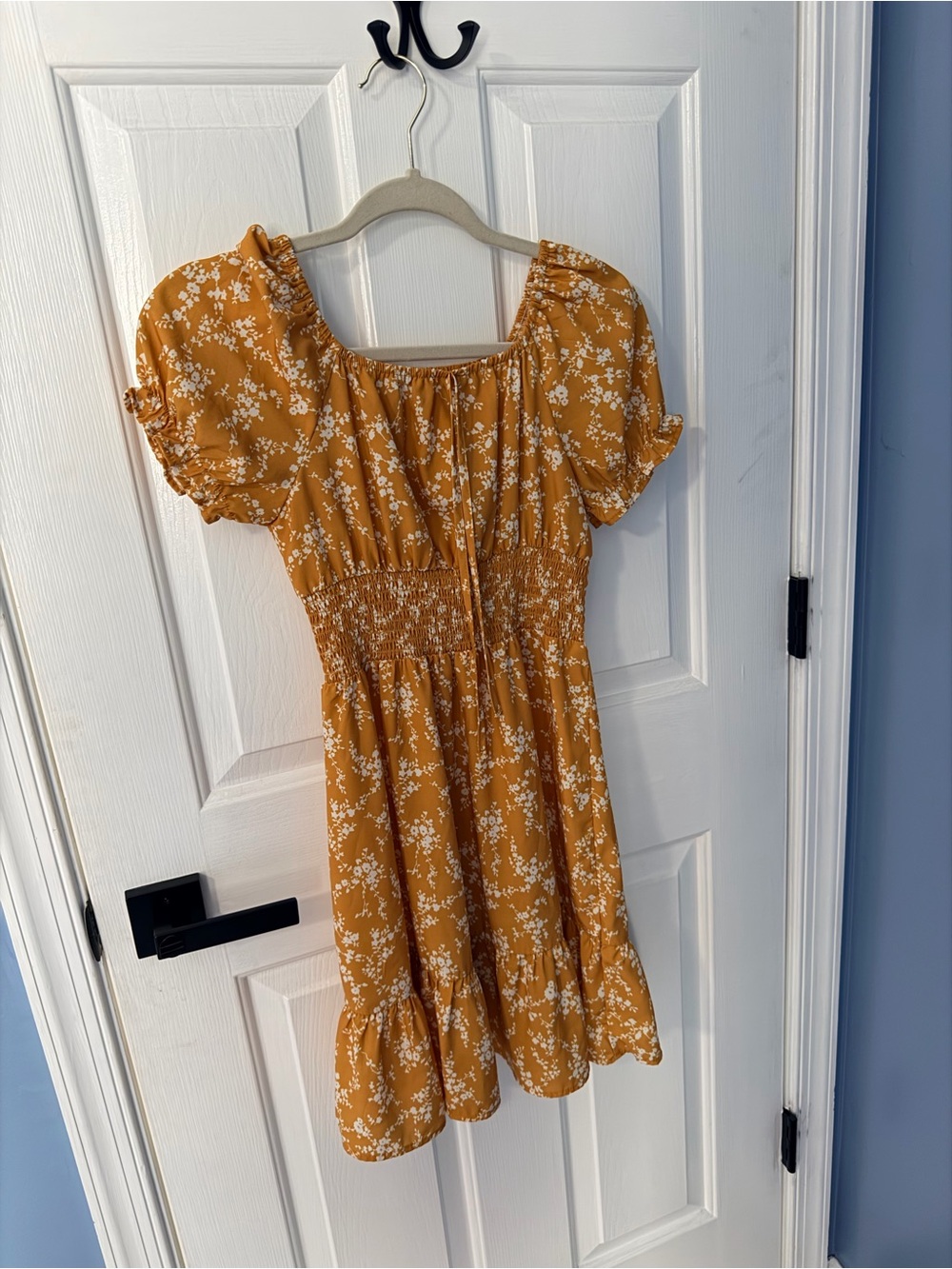 Girls size 10/12 gold/yellow and white floral dress.